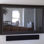 flat screen with mirror cover